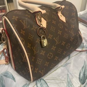 LV Print Speedy Bag with red insert